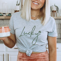 Lucky Script Tee – Minimal St. Patrick’s Day Clover Graphic T-Shirt – HO119