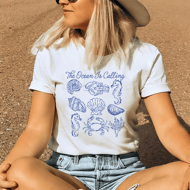 The Ocean Is Calling Graphic Tee – Coastal Seashell Shirt – Beach Lover Nautical T-Shirt - SE119