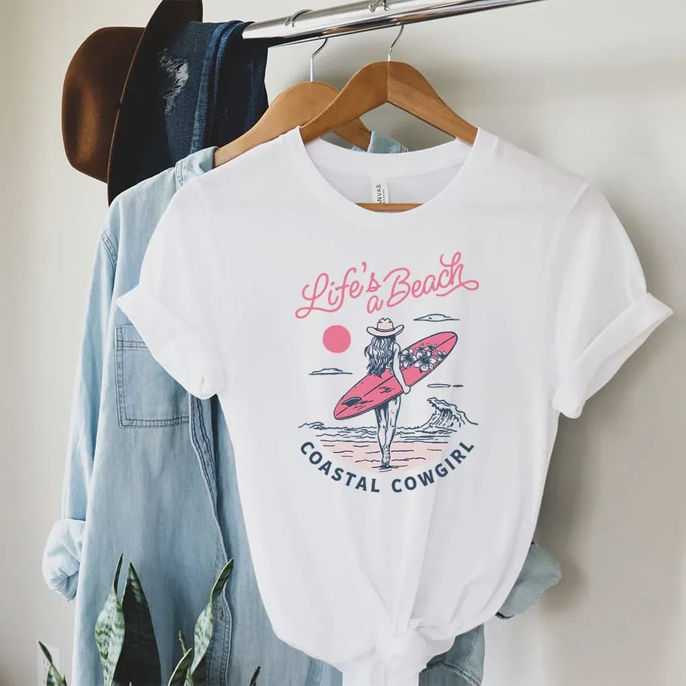 Rockledge Designs LLC Shirts & Tops Life’s a Beach Coastal Cowgirl Tee – Surf Girl Graphic Shirt – Western Beach Vibes T-Shirt - SU307 Life’s a Beach Coastal Cowgirl Tee – Surf Girl Graphic Shirt – Western Beach Vibes T-Shirt - SU307