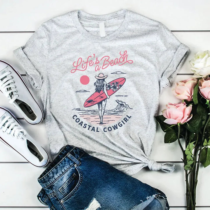 Rockledge Designs LLC Shirts & Tops Life’s a Beach Coastal Cowgirl Tee – Surf Girl Graphic Shirt – Western Beach Vibes T-Shirt - SU307 Life’s a Beach Coastal Cowgirl Tee – Surf Girl Graphic Shirt – Western Beach Vibes T-Shirt - SU307