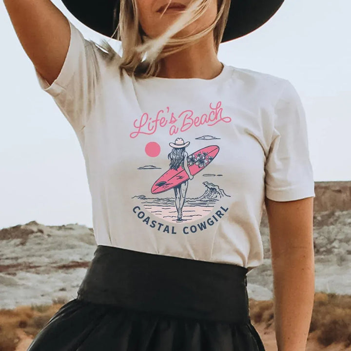 Rockledge Designs LLC Shirts & Tops Life’s a Beach Coastal Cowgirl Tee – Surf Girl Graphic Shirt – Western Beach Vibes T-Shirt - SU307 Life’s a Beach Coastal Cowgirl Tee – Surf Girl Graphic Shirt – Western Beach Vibes T-Shirt - SU307