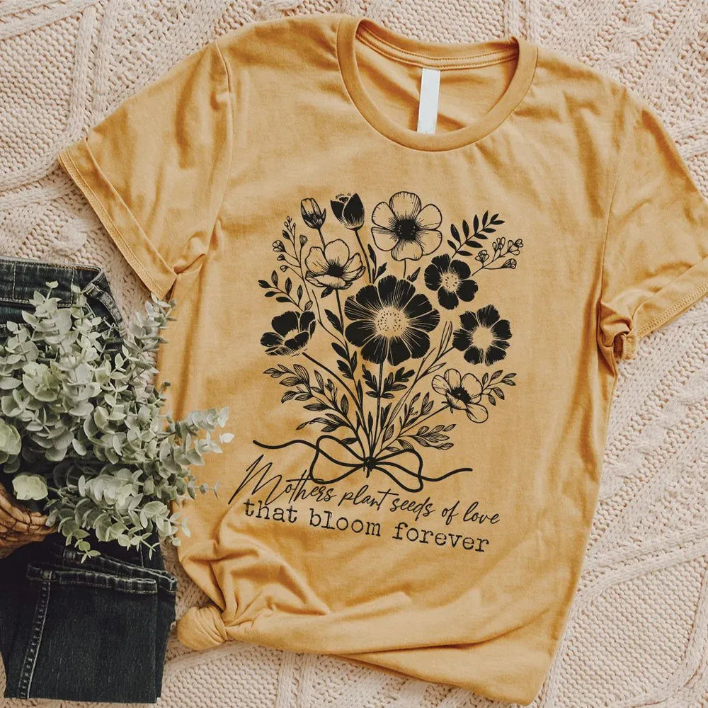 Rockledge Designs LLC Shirts & Tops Mothers Plant Seeds of Love Tee – Floral Mother’s Day Botanical Graphic T-Shirt - ML205 Mothers Plant Seeds of Love Tee – Floral Mother’s Day Botanical Graphic T-Shirt - ML205