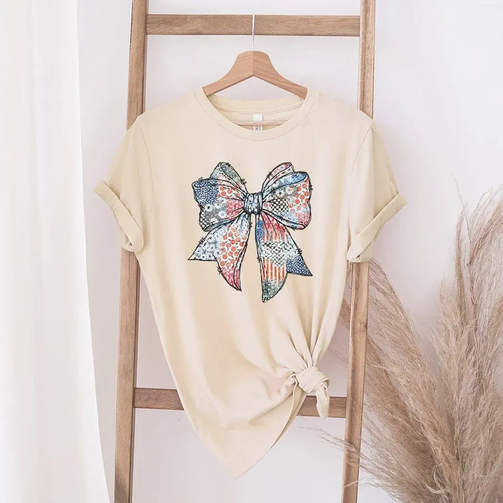 Rockledge Designs LLC Shirts & Tops Patriotic Patchwork Bow Tee – Vintage Americana Fourth of July Graphic T-Shirt - WE505 Patriotic Patchwork Bow Tee – Vintage Americana Fourth of July Graphic T-Shirt - WE505