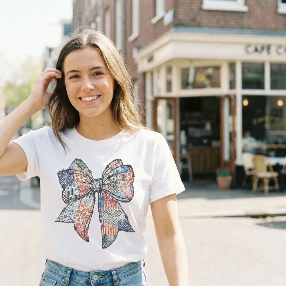 Rockledge Designs LLC Shirts & Tops Patriotic Patchwork Bow Tee – Vintage Americana Fourth of July Graphic T-Shirt - WE505 Patriotic Patchwork Bow Tee – Vintage Americana Fourth of July Graphic T-Shirt - WE505