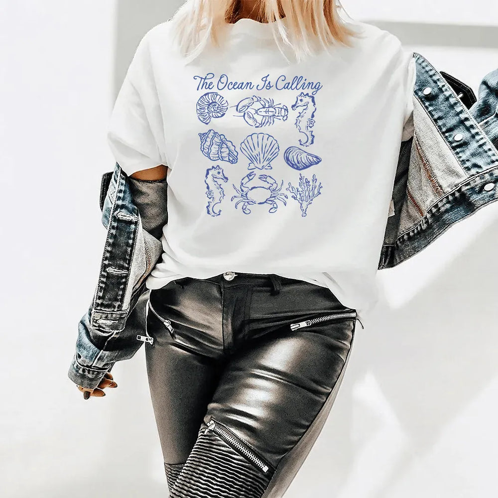 Rockledge Designs LLC Shirts & Tops The Ocean Is Calling Graphic Tee – Coastal Seashell Shirt – Beach Lover Nautical T-Shirt - SE119 The Ocean Is Calling Graphic Tee – Coastal Seashell Shirt – Beach Lover Nautical T-Shirt - SE119